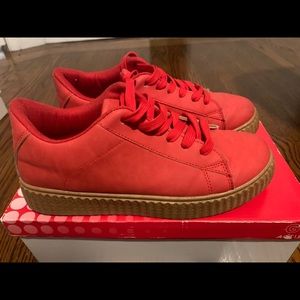 Red platform sneakers